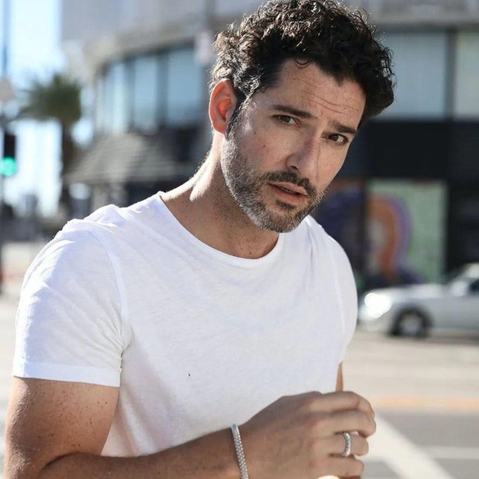 Tom Ellis curly