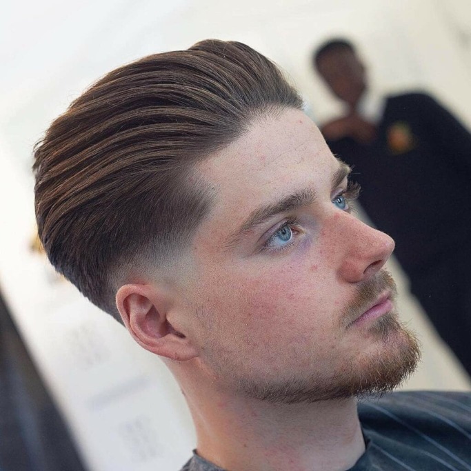30 Italian Men Hairstyles That Will Make You Stand Out 19 slicked back pompadour with skin fade 30 Italian Men Hairstyles That Will Make You Stand Out
