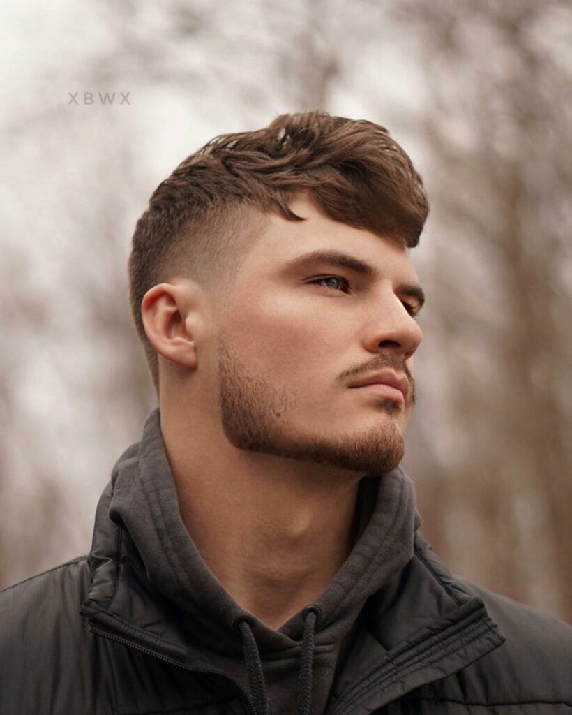 High Fade Haircut: A Trendy and Versatile Style for Men 19 High fade with Side Bangs