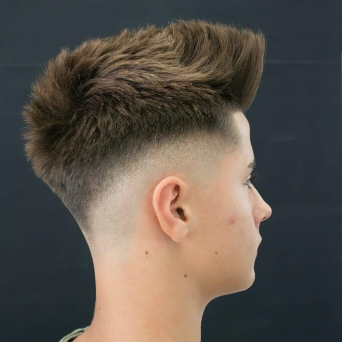 Discover the Hottest Trend in Men's Skin Fade Haircuts 11 Skin Fade Haircut with Faux Hawk