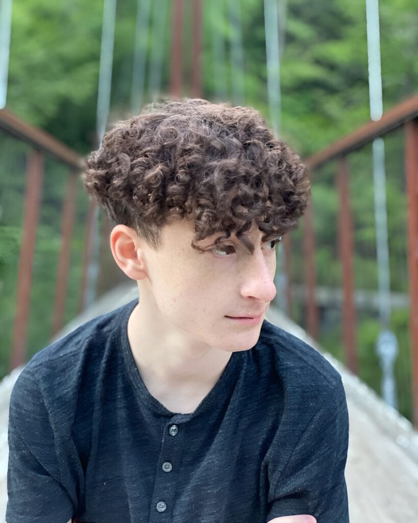 Regular Haircut Reinvented: A Fresh Take on Timeless Style 32 wildly wavy hair designs