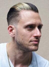 33 Slicked Back Haircut for a Sleek and Youthful Appearance 21 Parted Middle Puffy Slicked Back