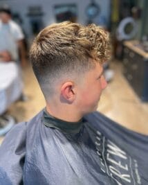 Discover Men's Fringe Haircut Magic: The Style You Can't Resist! 31 Golden Arc Fringe