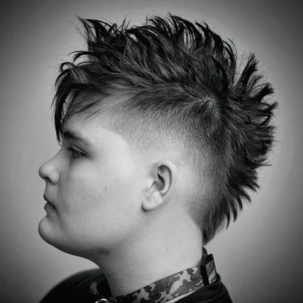 Kids Mohawk Haircuts: Fun, Edgy Styles for Your Little Rockstar 8 Faded Sides with Artistic Touches