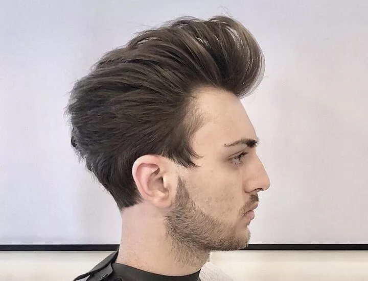 Tame Your Mane: Men's Haircuts for Straight Hair to Make Heads Turn 18 Slicked back Men's Haircuts for Straight Hair