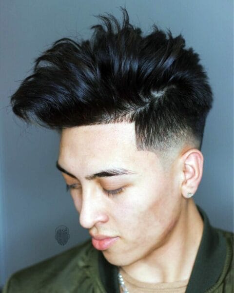 Side Swept Undercut: The Edgy Fusion of Classic and Modern 9 Drop Fade with Afro Disconnection: Bold, Striking, and Unforgettable